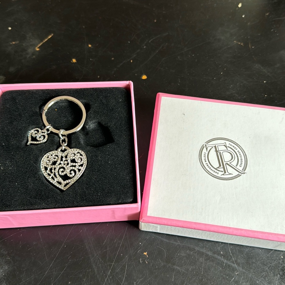 New. Like diamond heart keychain.